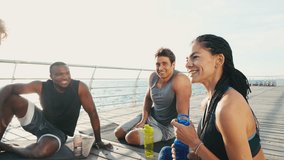 Group of people take break from yoga session to drink water and rehydrate. Rest after hard workout and quench thirst. Pleasant fatigue after exercise - Powered by Shutterstock - Get 15% off with code: PIKWIZARD15