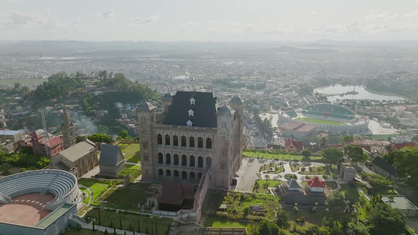 Fly over the Malagasy flag on Rova - kings palace on the hill in Antananarivo - capital of Madagscar