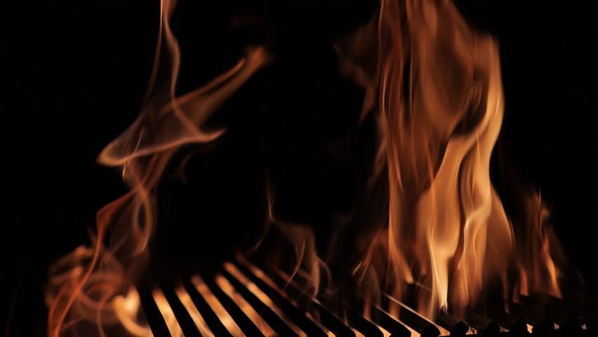 The fire burns through the grill grate. Hellish barbecue. Hearth in the fireplace. Royalty-Free Stock Footage #1110656667