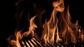 The fire burns through the grill grate. Hellish barbecue. Hearth in the fireplace. - Powered by Shutterstock - Get 15% off with code: PIKWIZARD15