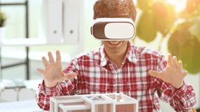 Virtual reality futuristic design technology. Architect or design engineer in VR headset for BIM technology designing a 3D model - Powered by Shutterstock - Get 15% off with code: PIKWIZARD15
