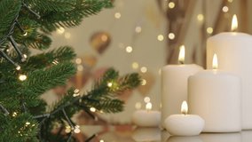 Christmas tree decorated on background. Winter holidays concept close-up burning candles. Evergreen tree bokeh flickering light bulbs garlands. Celebrating Happy New Year at home. - Powered by Shutterstock - Get 15% off with code: PIKWIZARD15
