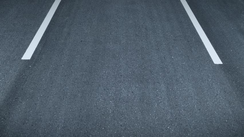 The asphalt road, freshly paved and jet-black, commands attention. A car roars down the motorway, a symbol of power and speed, leaving a trail of burnt rubber and dreams in its wake. POV view. 4K.
