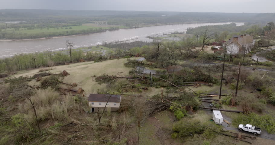 Aerial Forward Shot Of Damaged Trees By River, Drone Flying Over Landscape - Little Rock, Arkansas
