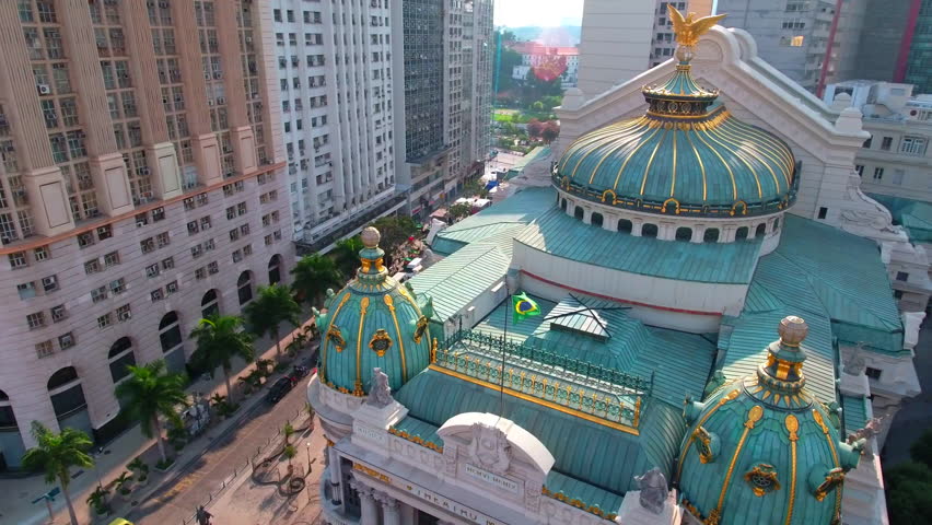 Aerial Panning Shot Of Theatro Municipal Amidst Buildings And Streets In City - Rio de Janeiro, Brazil