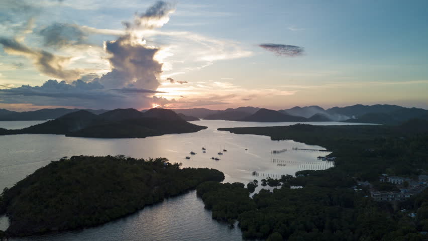 Aerial Time Lapse Shot Of Scenic Mountain By Sea Against Cloudy Sky - Hong Kong, China