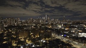 Aerial view of Downtown Brooklyn and Lower Manhattan at night. Shot during the autumn of 2023 in 4k in Fort Greene, Brooklyn.