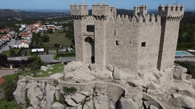 Panoramic aerial drone exterior view at the iconic Penedono Castle and main entrance gate, on Penedono village downtown, Viseu, Portugal