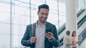 Phone, smile and business man at airport lobby for social media, search app or email. Happy, smartphone and Asian professional with bag or luggage for travel, communication and consultant walking - Powered by Shutterstock - Get 15% off with code: PIKWIZARD15