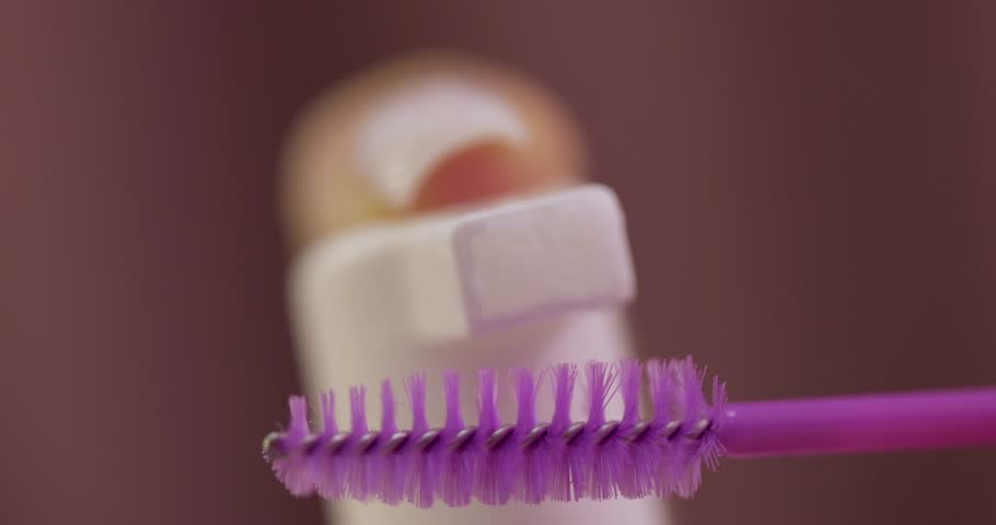 The process of cleaning the brush with foam shampoo. eyelash extension | Shutterstock HD Video #1110681053
