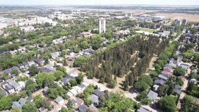 Aerial video of Nutana, Saskatoon, SK, capturing its historic charm, scenic river views, and bustling Broadway Avenue. A blend of tradition and modernity.