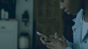 Animation of statistical, stock market data processing over african american woman using smartphone. Global economy and business data technology concept - Powered by Shutterstock - Get 15% off with code: PIKWIZARD15