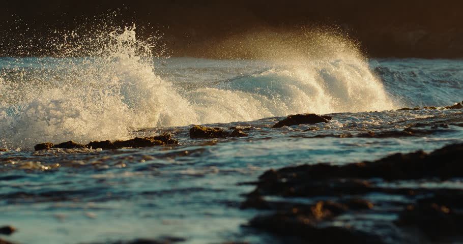 Powerful ocean wave breaking onto the reef at sunrise, super slow motion, 1000 fps | Shutterstock HD Video #1110694395