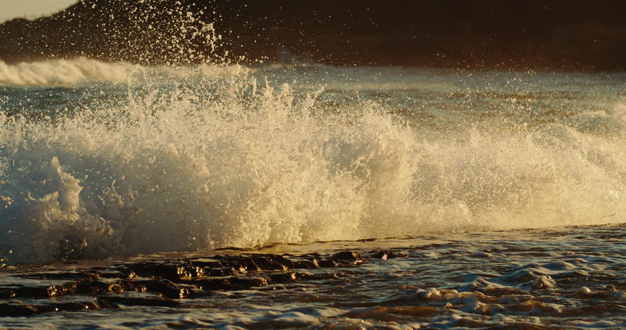 Ocean wave crashing at sunrise, super slow motion, 1000 fps | Shutterstock HD Video #1110694409