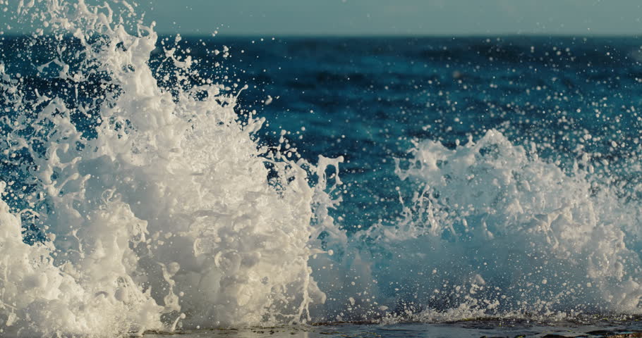 Super slow motion view of ocean wave crashing into the shoreline at 10000 fps | Shutterstock HD Video #1110694411