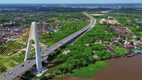 Aerial 4k video of Siak Bridge IV above Siak River in Pekanbaru, Riau, Indonesia