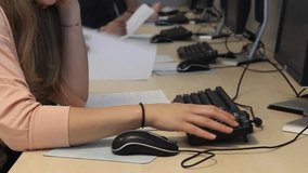 University students in the classroom using computer. - Powered by Shutterstock - Get 15% off with code: PIKWIZARD15