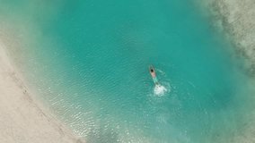 man swimming at nature pool sea, aerial man swimming at beach, Asha Resort Drone Aerial Kepulauan Seribu Indonesia, - Powered by Shutterstock - Get 15% off with code: PIKWIZARD15
