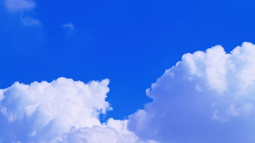 Dark blue sky and slow-moving clouds Royalty-Free Stock Footage #1110716219