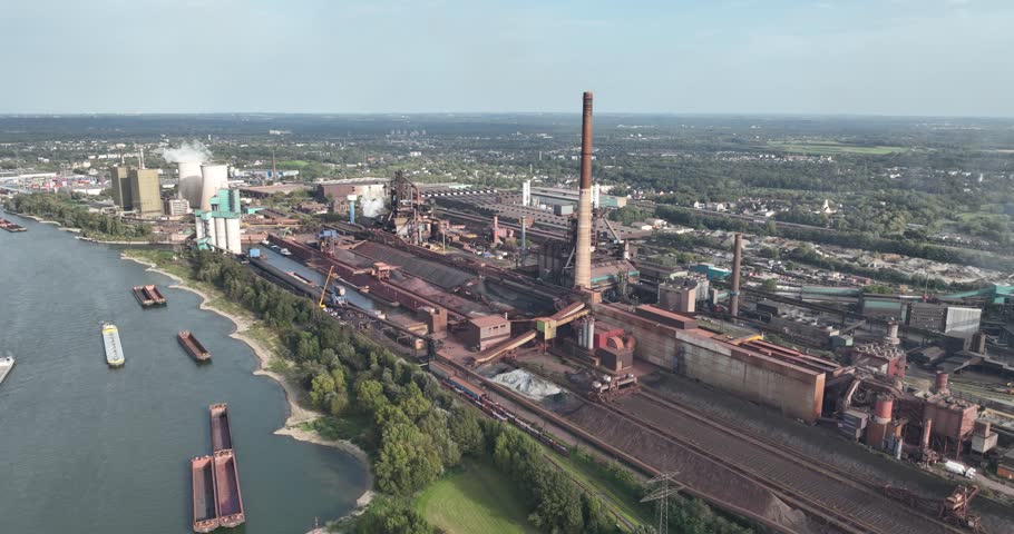 Blast furnace Iron and steel metal production in Duisburg, Germany, Heavy industry and ndustrial equipment. | Shutterstock HD Video #1110734349