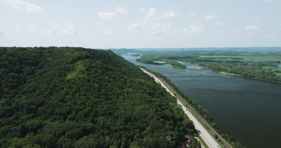 Tranquil Scenery Of Great River Bluffs State Park On The Mississippi River In Minnesota, United States - aerial shot