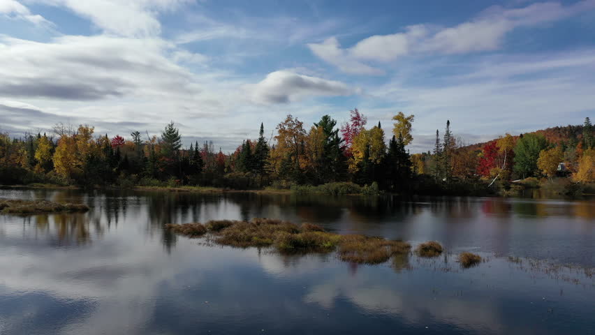 Aerial view of Fall (Autumn) foliage around a brook in New Hampshire.