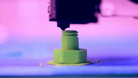 A 3D model or painting is produced by a printer. 4K video, 3D printing of the model, printing of the model, on a 3D printer, model creation faster video