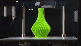 A 3D model or painting is produced by a printer. 4K video, 3D printing of the model, printing of the model, on a 3D printer, model creation faster video