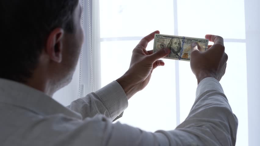 Man checking money. Fake money concept Royalty-Free Stock Footage #1110759921