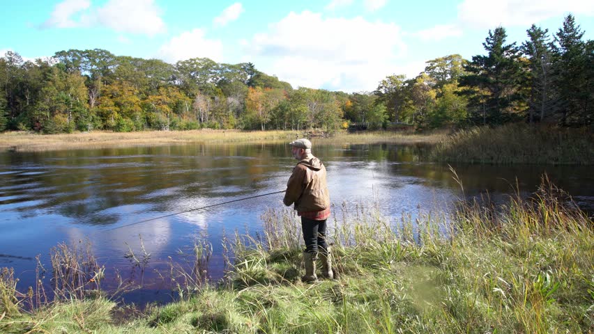 Fly-fishing in the autumn in Nova Scotia, Canada | Shutterstock HD Video #1110769669