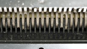 Clean teeth of the shredder rotation, no paper. Document shredder from below. Used for cut and destroy document with sensitive information, top secret, classified, personal identity thief protection. - Powered by Shutterstock - Get 15% off with code: PIKWIZARD15