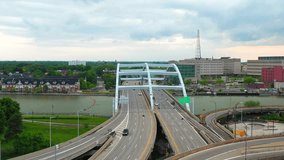 This video shows scenic aerial views of the Frederick Douglas Bridge in downtown Rochester.   