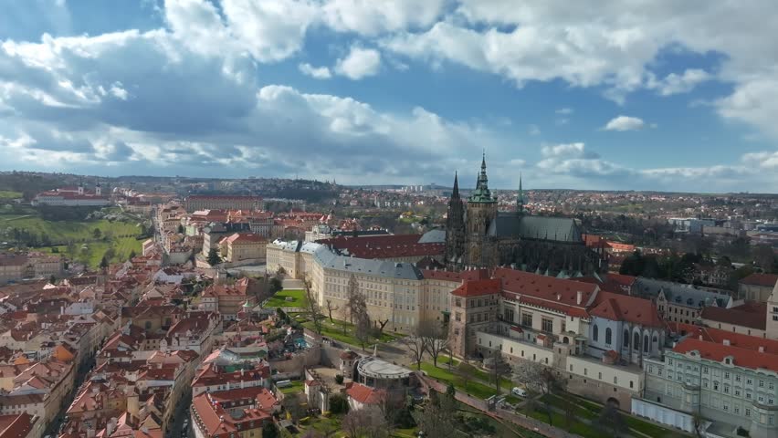 Aerial Prague panoramic drone view of the city of Prague at the Old Town Square, Czechia. Prague Old Town pier architecture and Charles Bridge over Vltava river in Prague at sunset, Czech Republic.