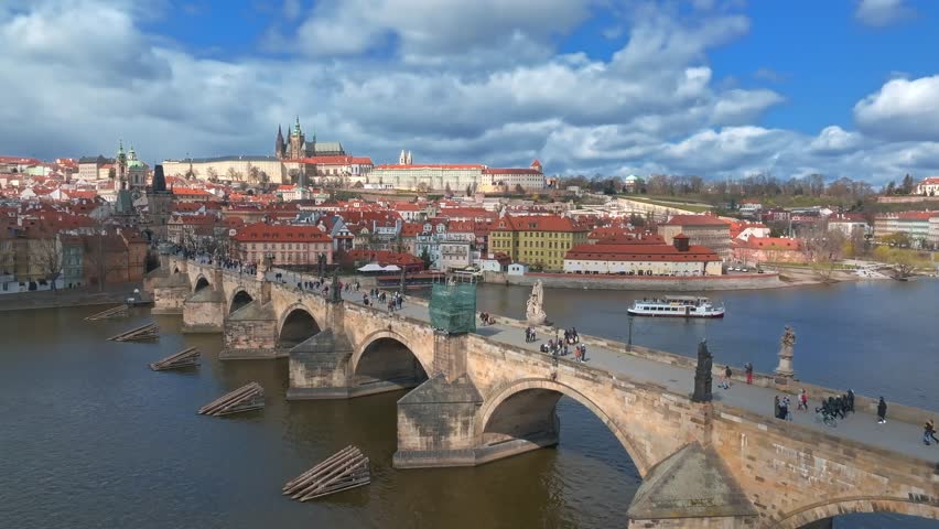Prague - Charles bridge, Czech Republic. Scenic aerial view on the architecture of the Old Town Pier and Charles Bridge over the Vltava River in Prague, Czech Republic.