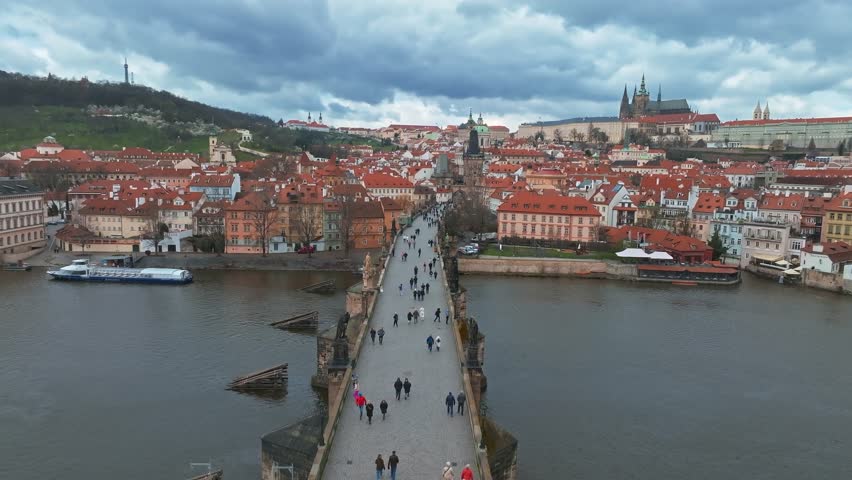 Prague - Charles bridge, Czech Republic. Scenic aerial view on the architecture of the Old Town Pier and Charles Bridge over the Vltava River in Prague, Czech Republic.