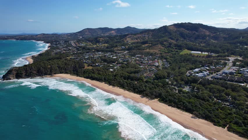 Idyllic Scenery At Sapphire Beach With White Bluff Headland In New South Wales, Australia - aerial shot