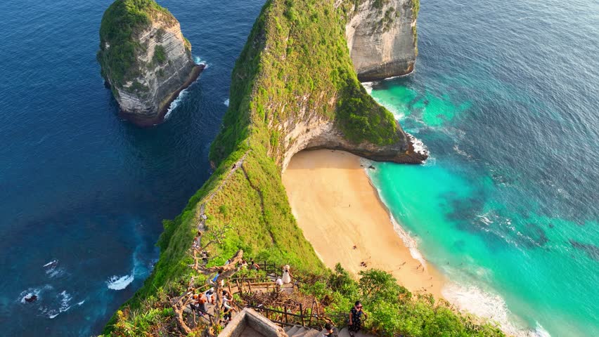 famous beach in Bali, Bali tropical lagoon, aerial view of paradise Nusa Penida island in Indonesia, amazing bay in Indonesia, idyllic Bali travel . High quality 4k footage Royalty-Free Stock Footage #1110789585