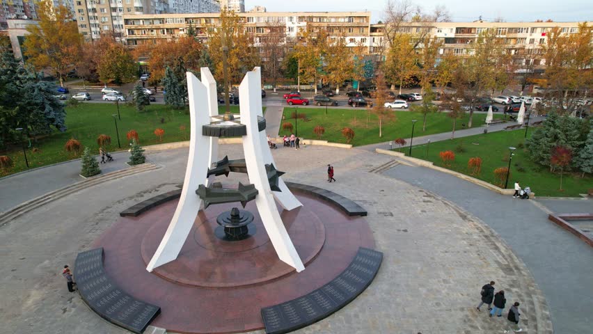Panoramic aerial view of Afghanistan Park, unofficial name of park located in center of Rascani district, heart of which is Memorial Complex Sons of Fatherland ,Holy Remembrance. Chisinau, Moldova. 4K