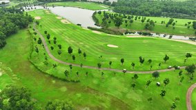 The course blends seamlessly into its natural surroundings. Aerial view reveals a breathtaking mosaic of rolling hills, meandering streams, and vibrant flora.
