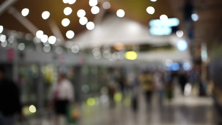 Blurred Interior view of Kuala Lumpur International Airport with shuttle train location that will carry passenger from international satellite building to main terminal