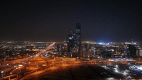 Drone shot of King Abdullah Financial District ( KAFD ) at night, Riyadh City, Saudi Arabia