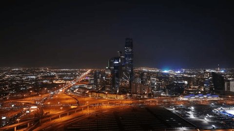 Drone shot of King Abdullah Financial District ( KAFD ) at night, Riyadh City, Saudi Arabia – Stockvideo