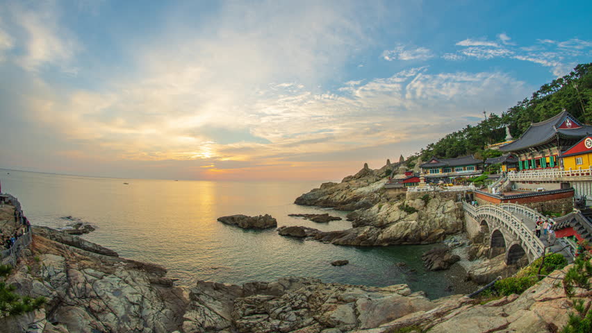 BUSAN - 4K Time Lapse Video, Morning Sunrise at Haedong Yeonggungsa Temple Located by the sea in Busan, South Korea.
