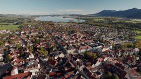 The drone aerial footage of Fussen town, and the High Castle, Hohes Schloss, Bavaria, Germany. Füssen is a town in Bavaria, Germany, in the district of Ostallgäu.