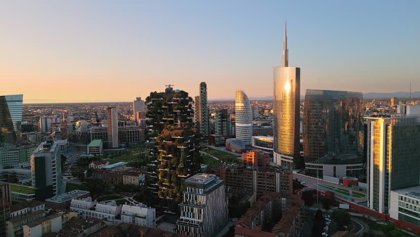 Aerial view drone of milan city skyline at sunrise,flying over porta garibaldi business district,financial area with modern building skyscrapers | Shutterstock HD Video #1110829729