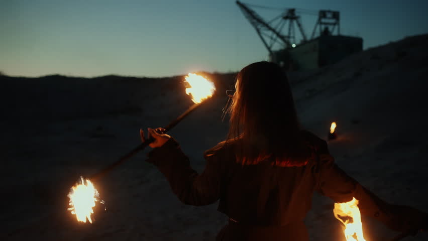 Fascinating Fire Performance, Happy Woman Dancing And Playing With Burning Torches
