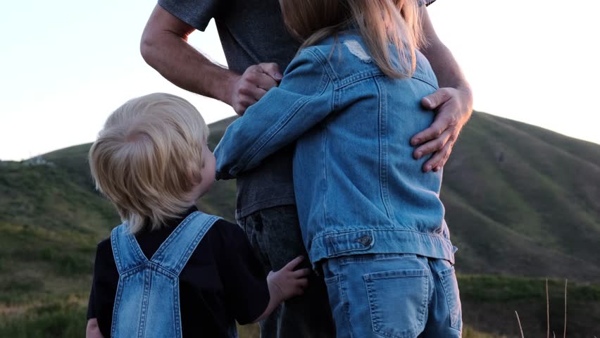 Father with children against the backdrop of nature. Royalty-Free Stock Footage #1110853233