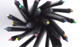 Top view of sharpened multi colored drawing pencils, rotating in a circle. Pile of colored pencils, top view, close-up.  - Powered by Shutterstock - Get 15% off with code: PIKWIZARD15