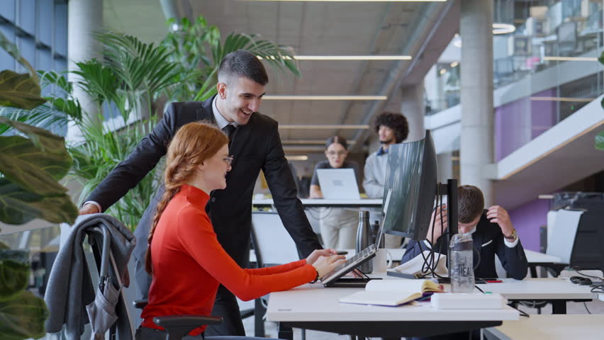 A diverse group of colleagues exchange business experiences, engage in collaborative problem-solving, and work together in a relaxed, modern office interior, demonstrating the value of teamwork and - Powered by Shutterstock - Get 15% off with code: PIKWIZARD15