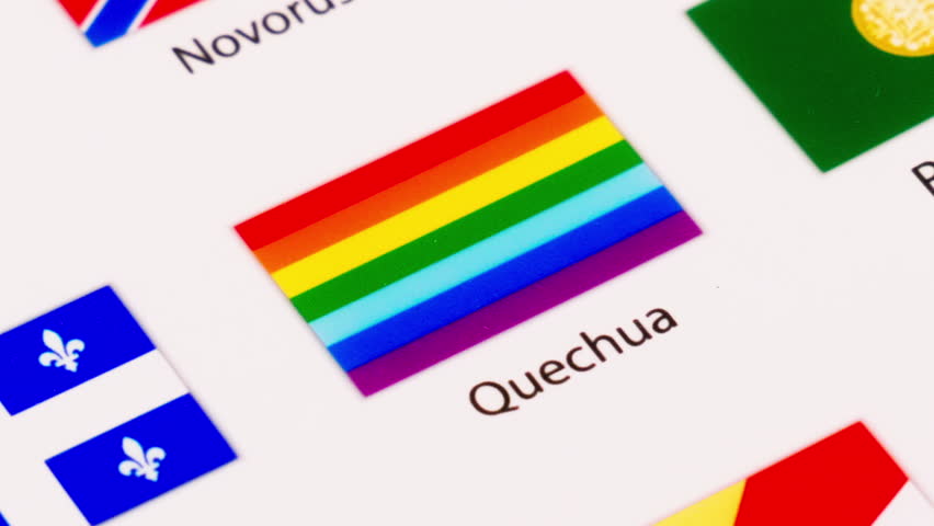 Close-up of various flags of countries, tribes, and territories from different parts of the world.